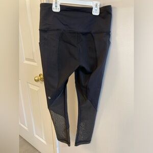 Lululemon Black capri Leggings with mesh cutouts size 4